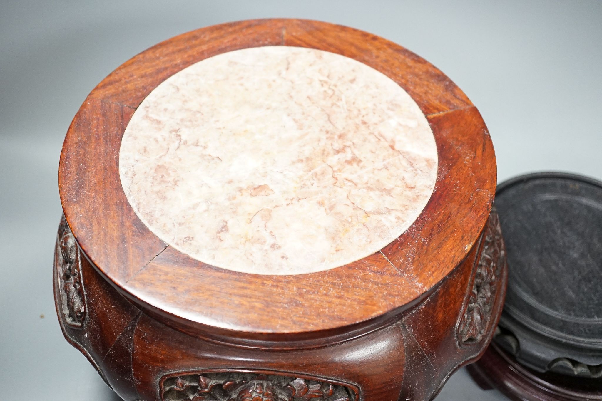 A group of Chinese hardwood stands, 19th/20th century, one marble inset, latter 19cm high